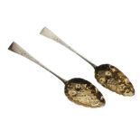 Pair of George III silver fruit spoons with gilt repoussé bowls, London 1804, 2.9toz approx