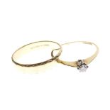 18ct gold and solitaire diamond ring, size L, together with an 18ct gold wedding band, size M, 4.