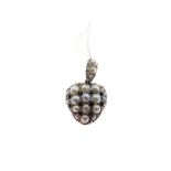 Unmarked yellow metal heart-shaped pendant set seed pearls and small sapphire-coloured stones,