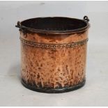 19th/20th Century copper cylindrical riveted bucket having iron loop handle, 42cm diameter, 36cm