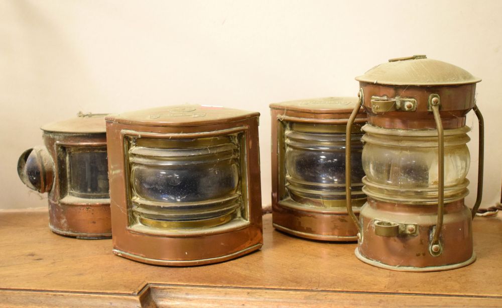 Four various ships copper lamps, the tallest standing 20cm high