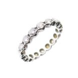Unmarked white metal and diamond full eternity ring, size N, 3.7g gross approx