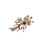 9ct gold floral spray brooch set seed pearl petals and four assorted coloured gem centres, 8.6g
