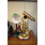 Brass desk lamp, green desk lamp and a reproduction stick telephone