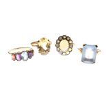 Three 9ct gold dress rings, together with a yellow metal and opal cluster ring stamped 9ct, 14g