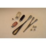 Assorted small silver to include glove stretchers, shoe horn, two scent bottles, and five assorted