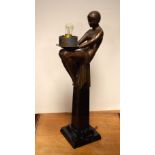 Art Deco spelter figural table lamp supported on a granite obelisk, overall height 47cm