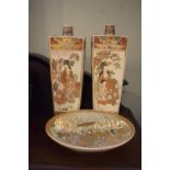 Pair of Japanese Satsuma tapered square pottery vases, 24cm high, and a similar plate,