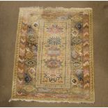 Belgian wool rug in 'Kabul' design, with abrashed beige field having five star medallions within