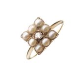 Unmarked yellow metal, diamond and seed pearl dress ring, set central diamond within eight seed
