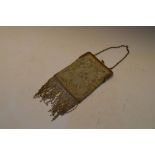 1920's Art Deco mesh evening bag, the silk interior with label Made in France, 23cm long including