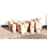 Large quantity of terracotta garden flower pots