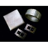 Art Deco silver cigarette case, 3.4toz approx, together with a pair of shoe buckles and a plated
