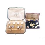 Two cased sets of collar studs, both in mother-of-pearl, one with blue enamel borders