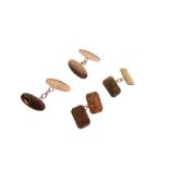 Pair of 9ct rose gold oval cufflinks, together with a pair of yellow metal canted oblong cufflinks