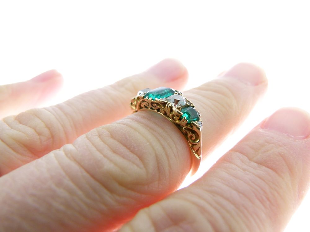 Five stone emerald and diamond ring, the graduated emeralds with an old mine cut between, and rose - Image 5 of 6