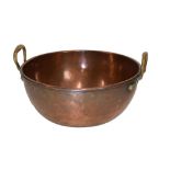 Large 19th Century two-handled copper bowl, of seamed construction with alloy handles, rolled rim