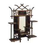 Late 19th Century black lacquered and bamboo wall mirror, with bevelled central rectangular mirror