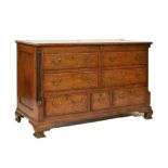 George III oak and mahogany 'Lancashire' mule chest, the hinged crossed banded top over two banks of