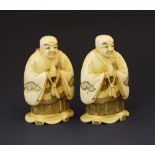 Pair of early 20th Century Japanese carved ivory okimono of monks, late Meiji/Taisho, each figure