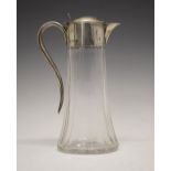 Late Victorian silver-mounted cut glass claret jug, of tapering oval section with hinged domed