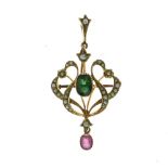 Edwardian tourmaline and seed pearl pendant brooch, stamped '15ct', the scroll frame with detachable