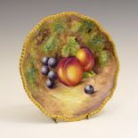 Royal Worcester porcelain side plate, hand-painted with peaches and red grapes, signed J.Cook, black