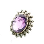 Late 19th Century amethyst and diamond cluster ring, unmarked, the oval cut measuring