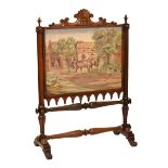 Mid 19th Century carved rosewood fire screen, the adjustable screen with counter weighted pulley,