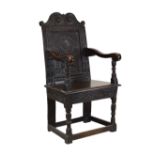 17th Century oak Wainscot chair, probably Scottish, the carved back with double scroll cresting over