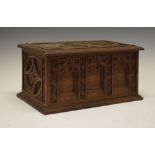 Late 19th/early 20th Century carved oak box, the hinged rectangular cover with Ecclesiastical-