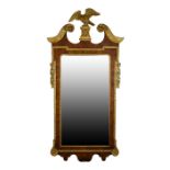 Georgian-style figured walnut and parcel gilt pier glass or wall mirror, with eagle cresting and