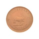 Gold Coin - South Africa Krugerrand, 1975 Condition: Light wear and some minor scratches to surface.