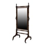 Early 19th Century mahogany cheval mirror, the plain rectangular plate within turned uprights and