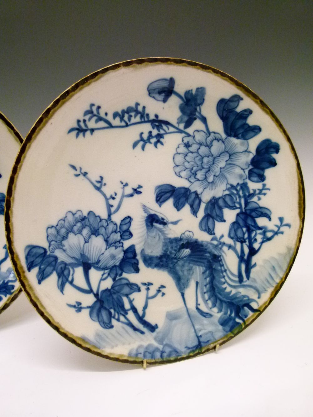 Pair of early 20th Century Oriental pottery plates, probably Japanese, each decorated in - Image 3 of 9