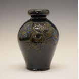 Elton Ware ovoid vase decorated with floral design against a dark blue and green ground, marks to