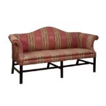 Georgian-style mahogany 'camel-back' settee, covered in striped damask, on moulded square section