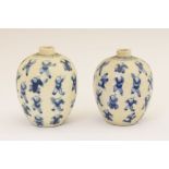Pair of 19th Century Chinese miniature vases, each of ovoid form decorated with thirty two figures