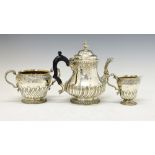 Victorian silver three piece tea set with embossed wrythened and gadrooned decoration consisting