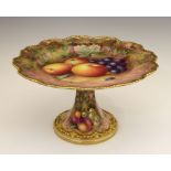 Royal Worcester porcelain pedestal dish, comport or tazza of wavy outline on octagonally-fluted