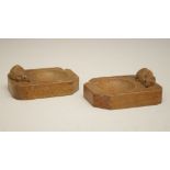 Workshop of Robert Thompson of Kilburn North Yorkshire - A pair of 'Mouseman' oak ashtrays, each