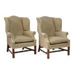 Pair of George III style wing armchairs, each having humped camelback and shaped wings, the out