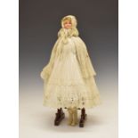 Early 20th Century bisque headed 'Parasol Doll', in lace clothing, doll having light blonde hair and