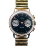 Breitling - Top Time ref: 2003, the gold plated case with signed black reverse panda dial, having