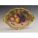 Royal Worcester porcelain two-handled oval dish, of wavy outline, hand-painted with apples and red