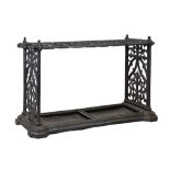 Good Victorian cast iron stick or umbrella stand, the rectangular frame with three rows of eight