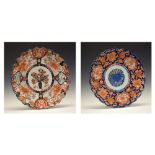 Two large late 19th/early 20th Century Japanese Imari porcelain chargers or dishes, late Meiji/