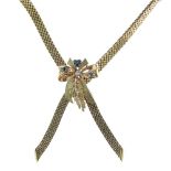 9ct gold crossover necklace, with a detachable diamond and sapphire brooch frontispiece, 41cm