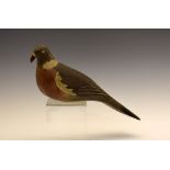Painted wooden decoy modelled as a Pigeon, probably early 20th Century, with glass eyes and