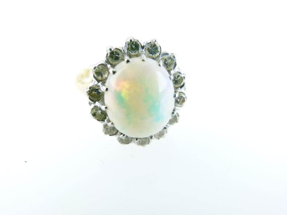 Opal and diamond cluster ring, unmarked, the oval cabochon measuring approximately 12.7mm x 10.4mm x - Image 4 of 7